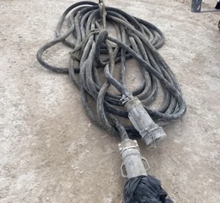 eMV cable coiled directly on the ground with no protection